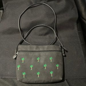 Palm Tree handbag. One outside pocket.